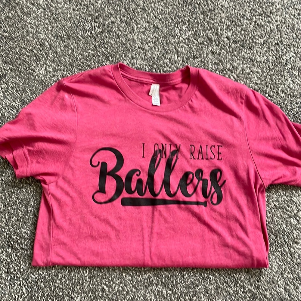 “I only raise ballers” t-shirt.  Red with black lettering.